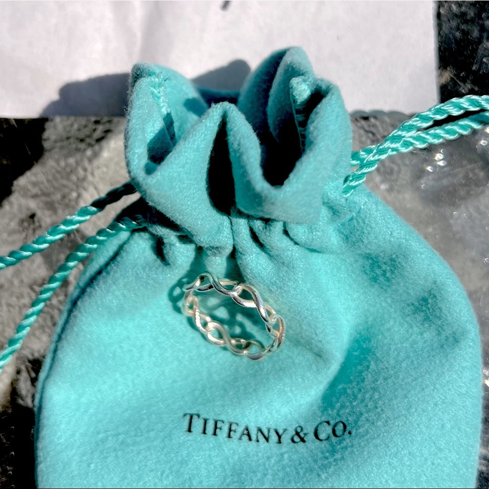 Tiffany & Co. SS Infinity Ring sz. 5